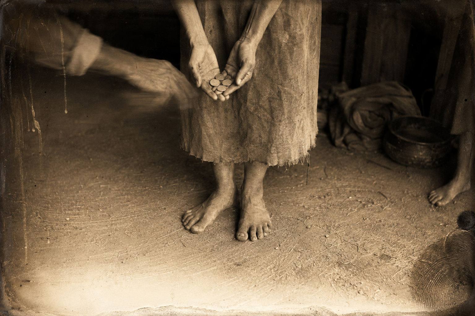Call pays the widow a month's wage for each boy, knowing she will need it; her bare feet on the bare dirt floor.