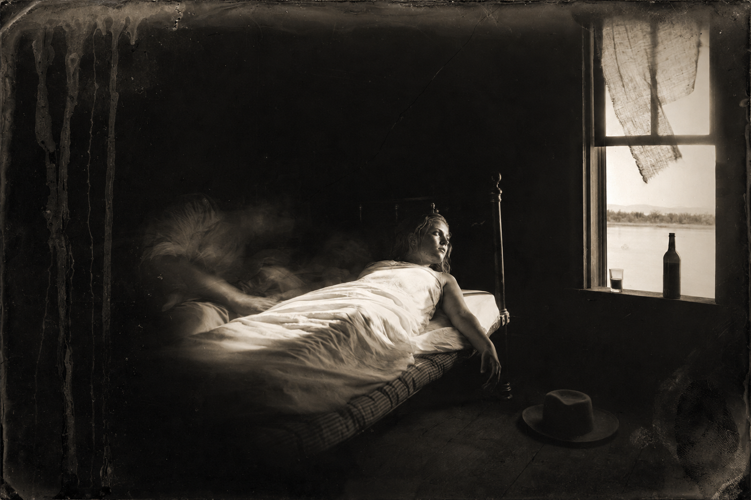 The lamp is blown out and a shaft of moonlight cuts across their bodies; Jake sleeps, and Lorena lies awake looking out the window, waiting for it to be time to leave.