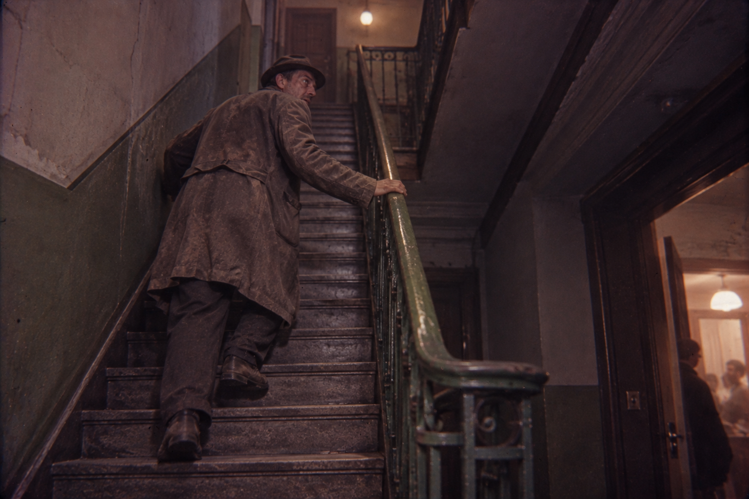 Up the stairwell past the Persickes' racket